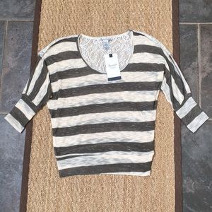 Striped sweater top.